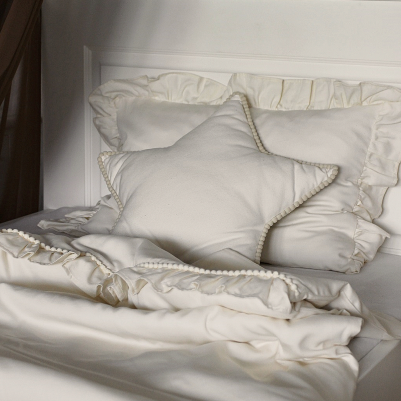 Sternkissen Boho mit Pompoms vanille online kaufen