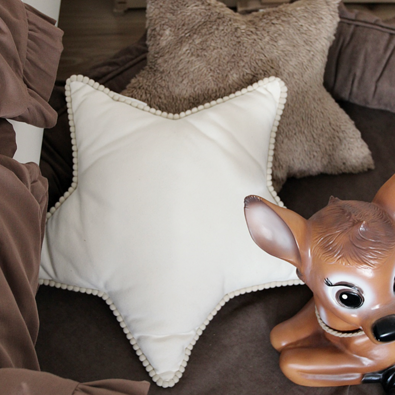 Sternkissen Boho mit Pompoms vanille online kaufen