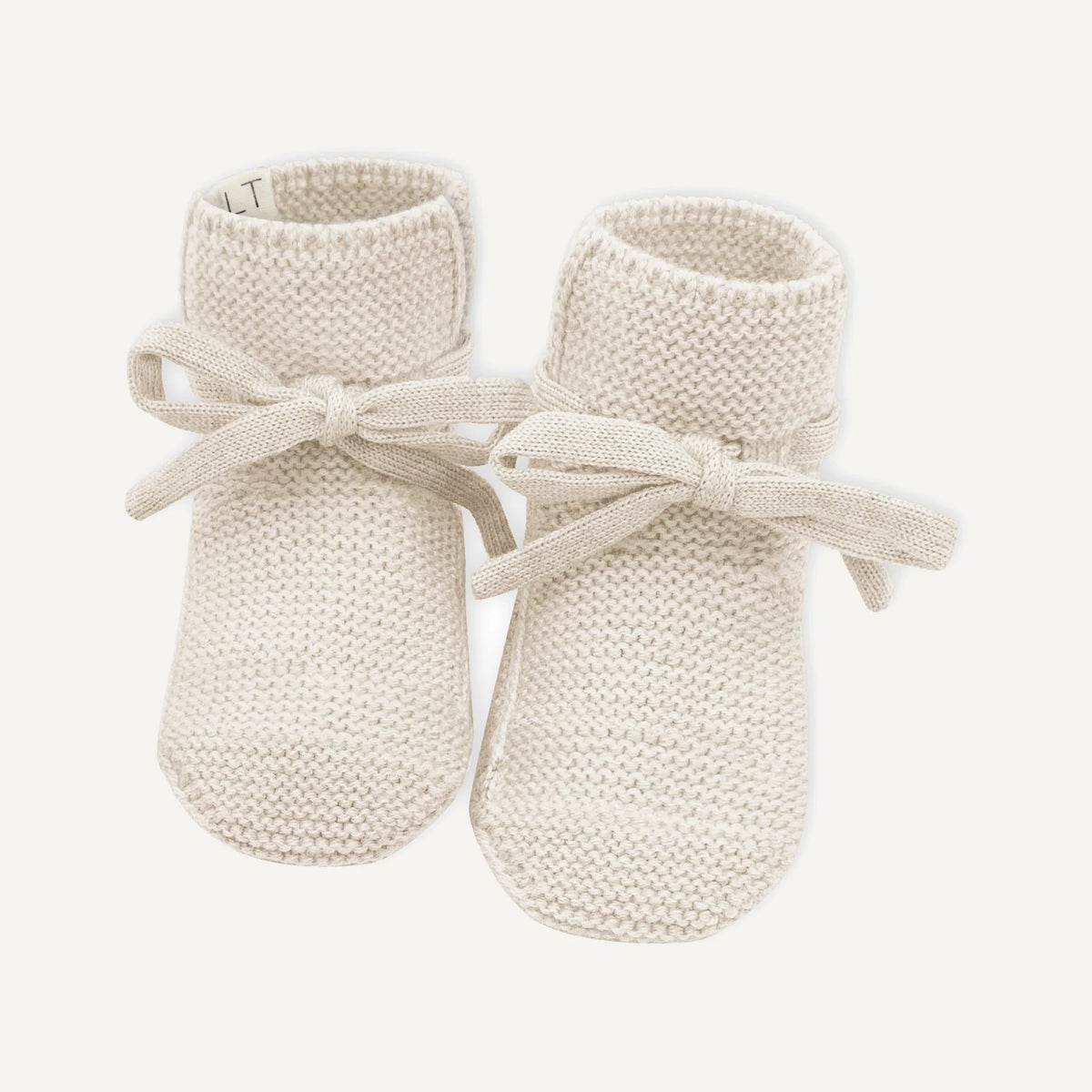Lille oni gestrickte Babyschuge aus Merinowolle in Creme