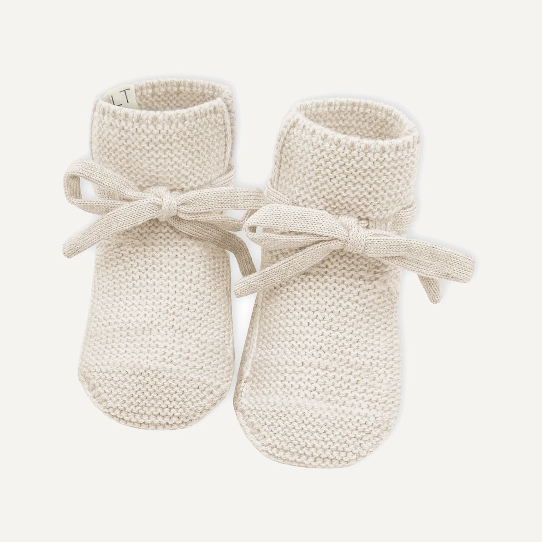 Lille oni gestrickte Babyschuge aus Merinowolle in Creme