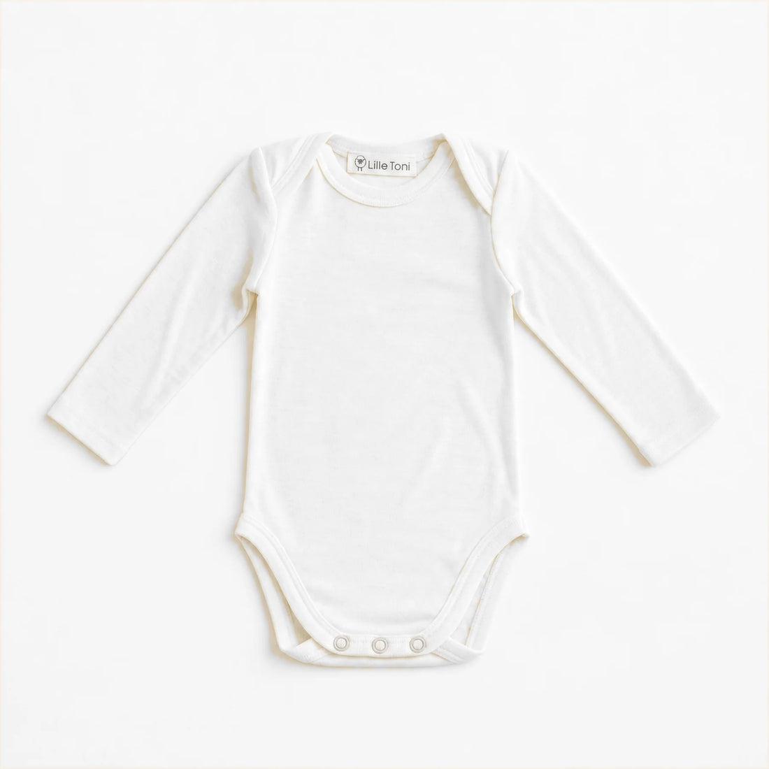 Baby Body aus Merinowolle in Creme von Lille Toni