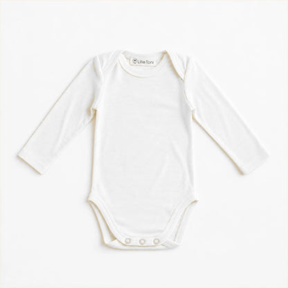 Baby Body aus Merinowolle in Creme von Lille Toni