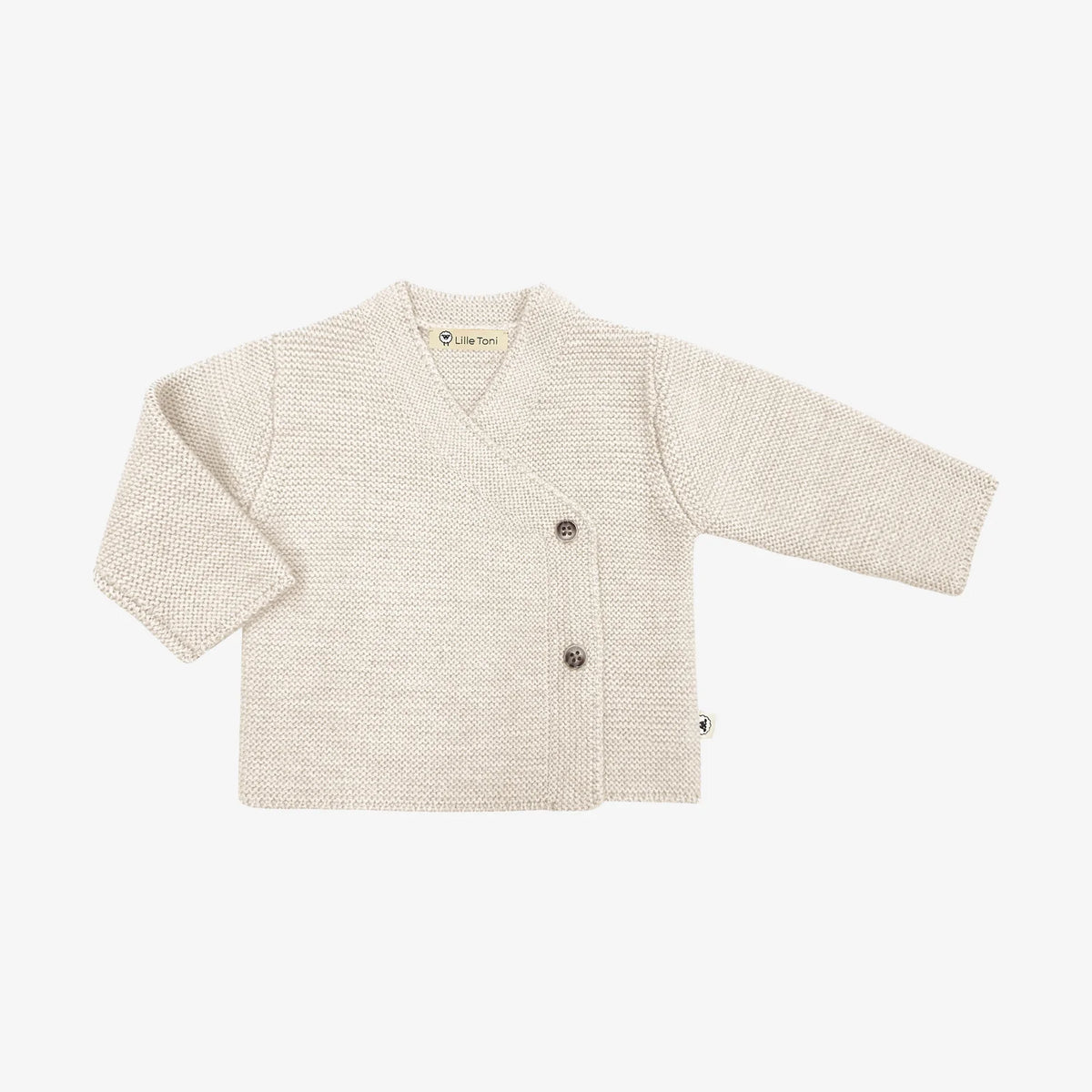 Lille Toni Baby Wickelpullover creme aus Merinowolle mit seitlichen Knöpfen