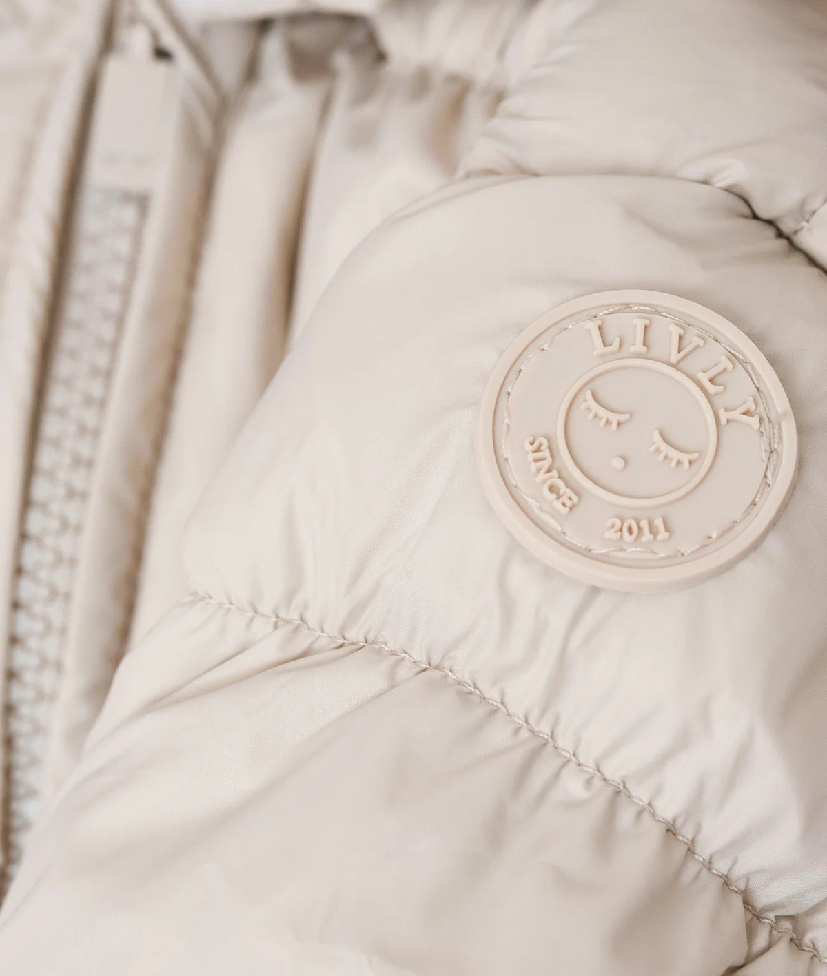 Baby Winteroverall mit Daunenfüllung - beige